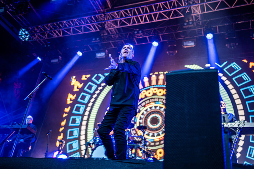 OMD performing live at Rochdale Town Hall Square in 2026