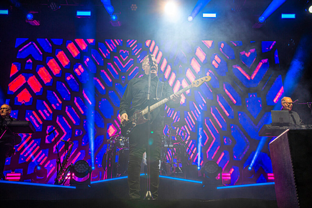 OMD performing live at Rochdale Town Hall Square in 2026